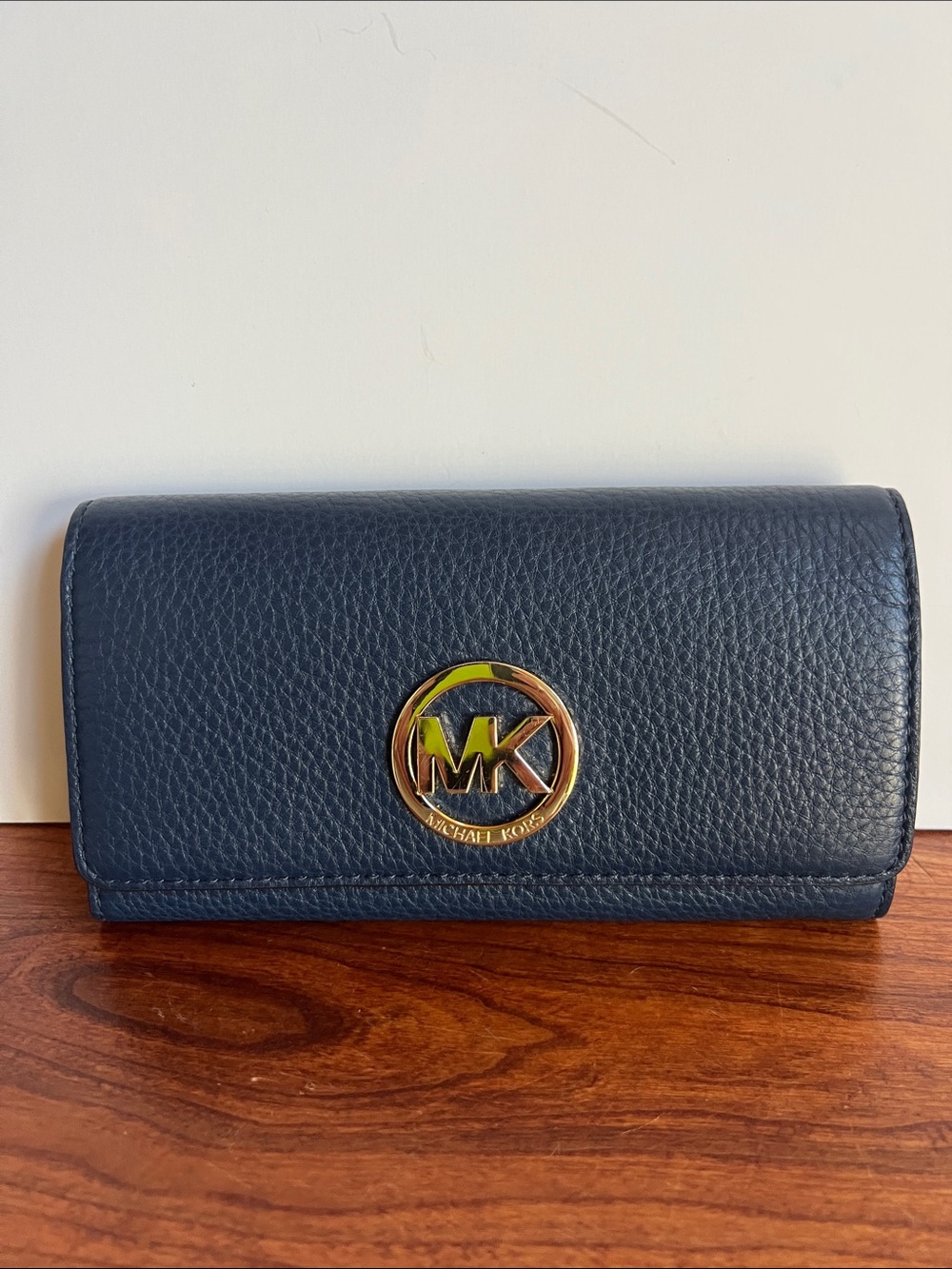 Michael Kors Dark Blue Pebbled Leather Wallet with Gold MK Emblem